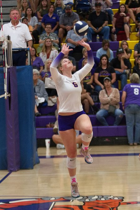 Lliz schalde goes high against Hanford as Tigers win 3-0 in sets.